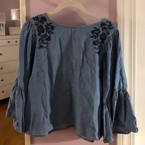 Blue jean bell sleeved top.